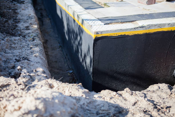 Professional Waterproofing technician working in Parrottsville, TN